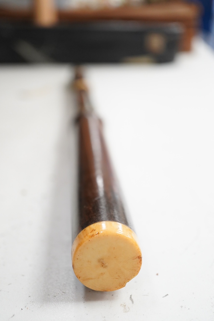 A 19th century crocus wood and ivory flute possibly by Metzler, six holes and one key to the foot joint, 60.5cm long, ivory submission ref: HMMH3U4M